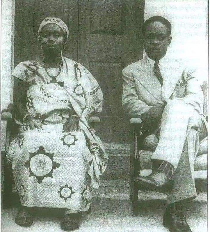 Kwame Nkrumah and His Mother, Elizabeth Nyaniba Kwame Nkrumah sits beside his mother, Elizabeth Nyaniba, in a black-and-white portrait.